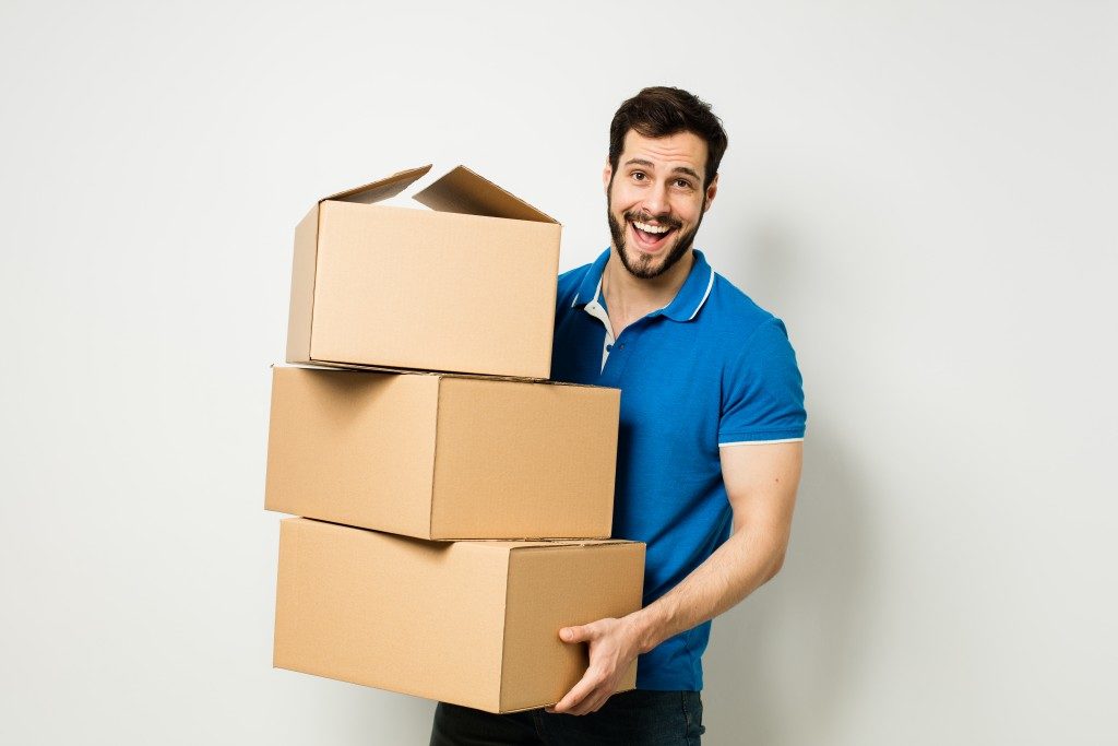 Man Happy with Moving Package