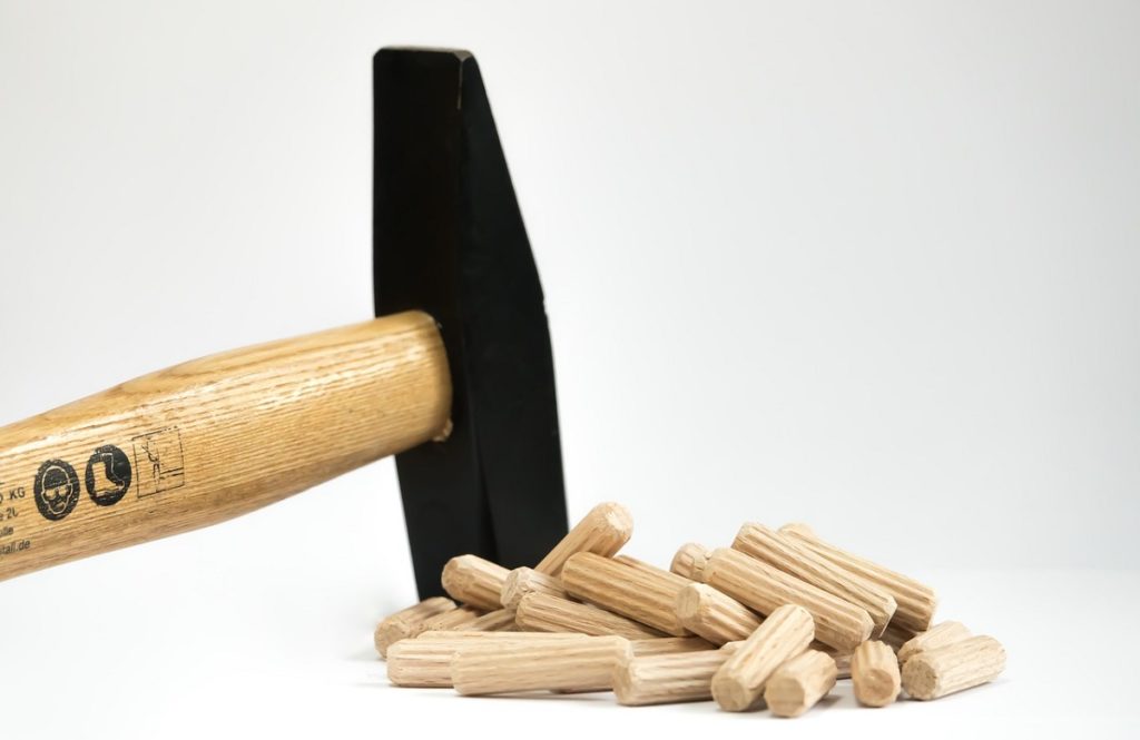Wooden hammer with round dowels