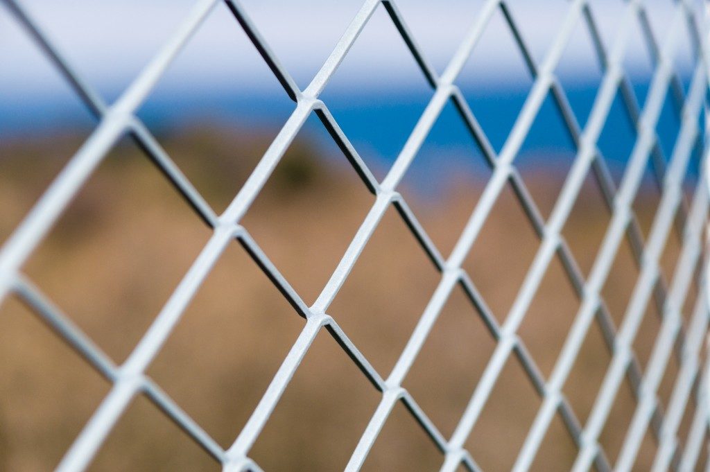 Metallic chain link fence up close