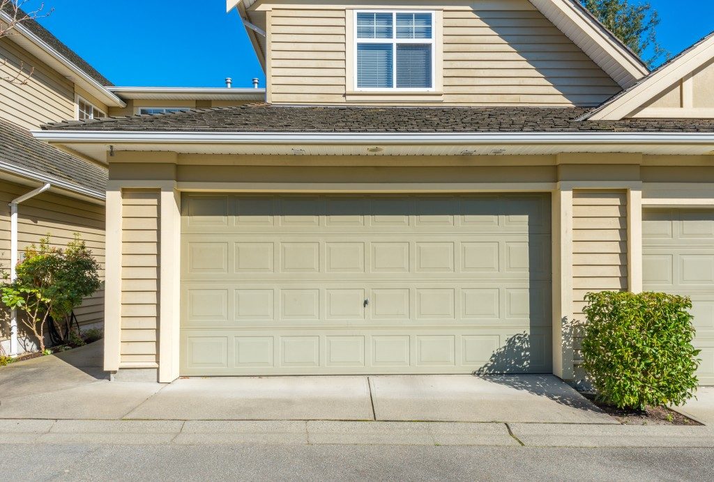 closed garage door of a modern house subdivision