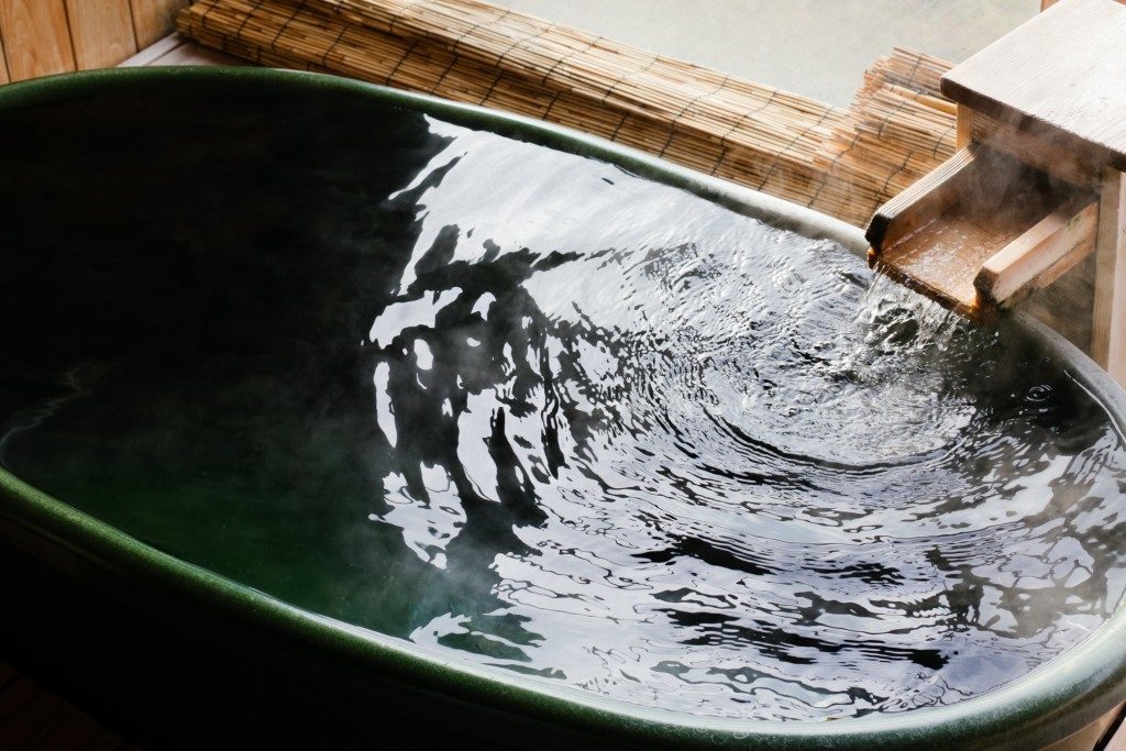 water flowing into hot tub